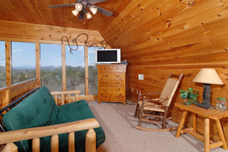 Relax in this Tennnessee Vacation Rental that has a Mountain View from the lofted extra sleeping.